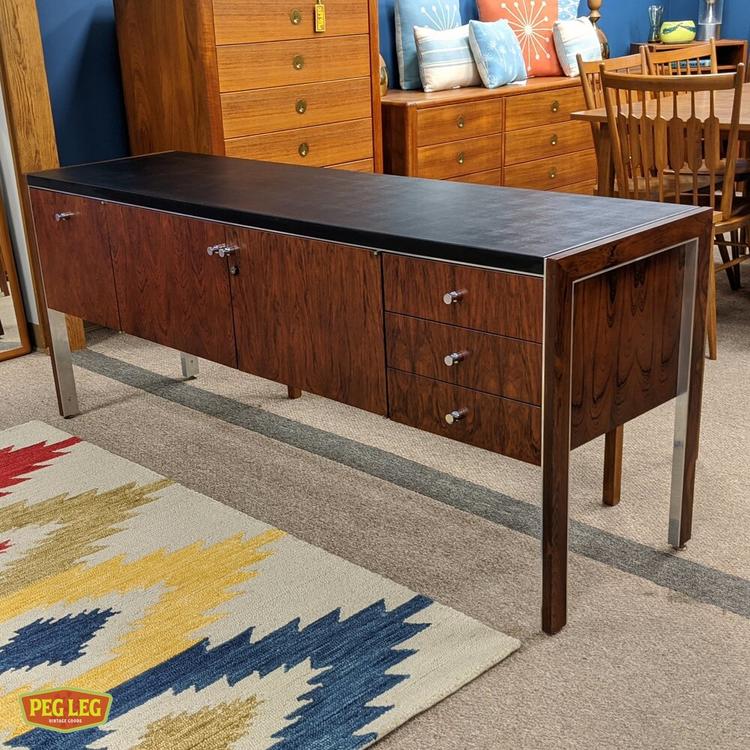Rosewood credenza with leather top by Herman Miller for Biltrite.