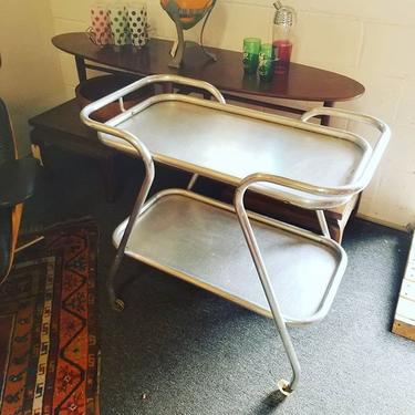                   Two tiered metal bar cart. $75