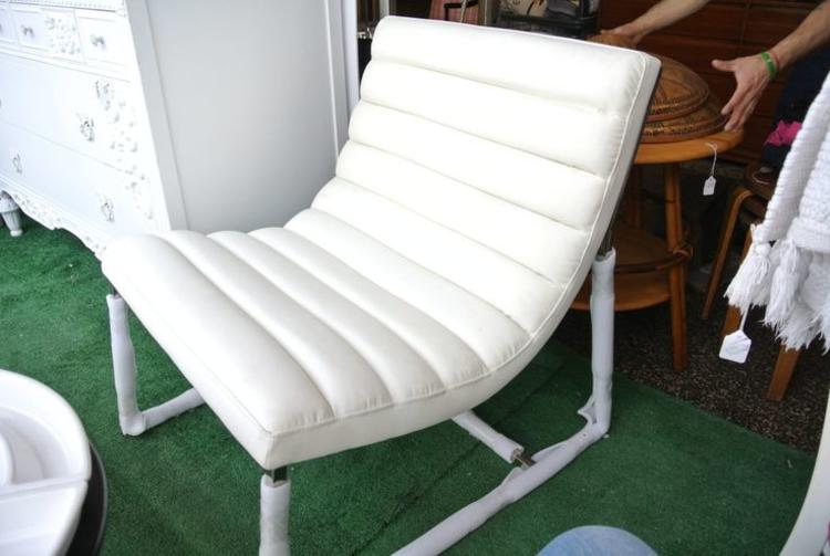                  Chrome and White chair. $295
