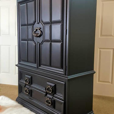 Black armoire (Thomasville) Dresser / Chest / wardrobe