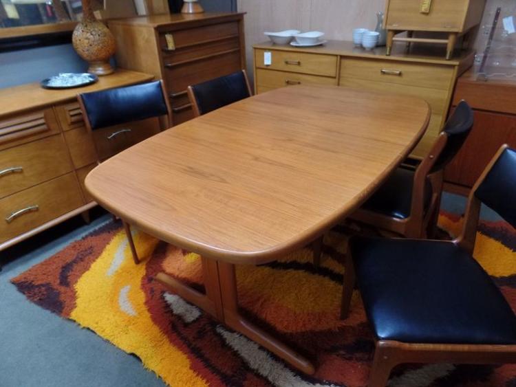 Danish Modern oval teak dining table with one leaf