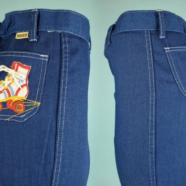 1970s roller skate jeans. Dark denim. Patch on the pocket. Embroidery. Novelty vintage. Toughskins. (30-32 x 30) 