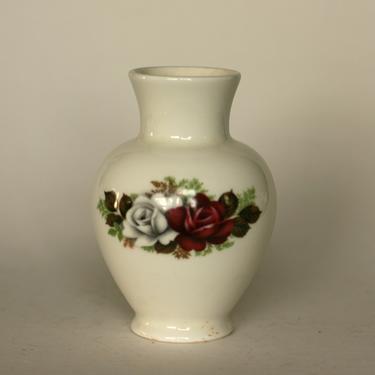 vintage Arabia Finland vase with red and white roses 
