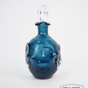 Blue glass decanter with clear stopper