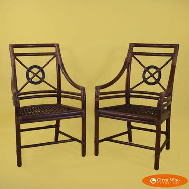 Pair of McGuire Target-Back Arm Chairs