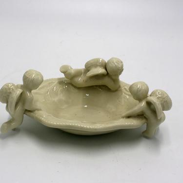 vintage cherub pottery soap dish 