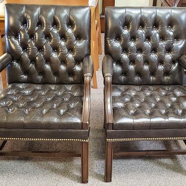 Item #RT Pair of Leather Chesterfield Arm Chairs