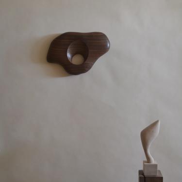 “Clava” a wooden wall sculpture by Chandler McLellan