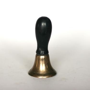 vintage old school brass school bell with wood handle 