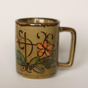 vintage speckled stoneware glazed mug with orange flowers 