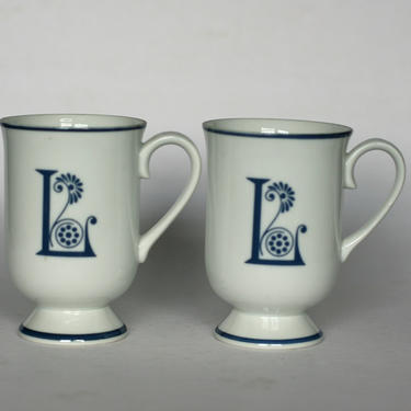 vintage Holt Howard pedestal mugs with a floral monogrammed 'L'/set of two 