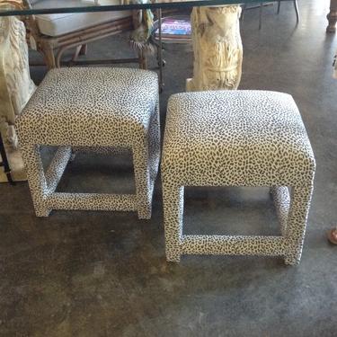 Pair of upholstered vintage ottomans