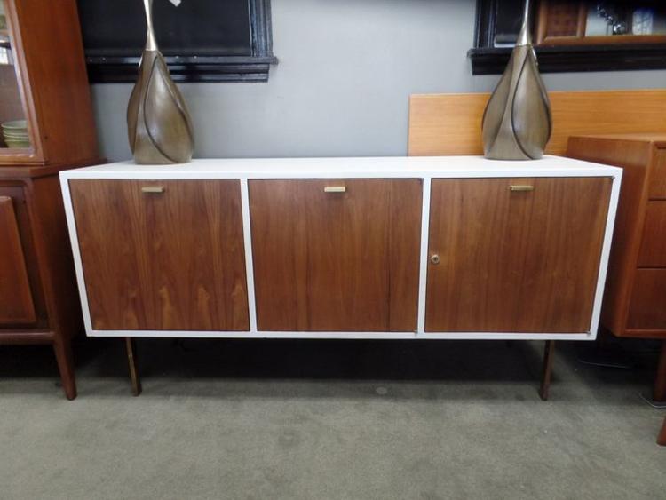 Mid-Century Modern walnut and white painted credenza with pullout bar and brass accents
