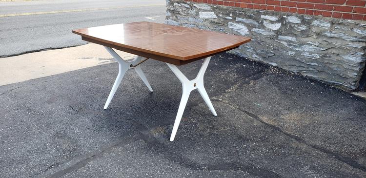 X Base dining table with laminate top