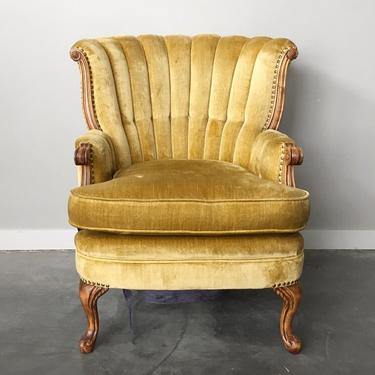 vintage plush gold channel back chair.