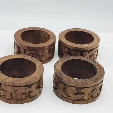 Set of (4) Wooden carved  Napkin rings from India- Pier One 