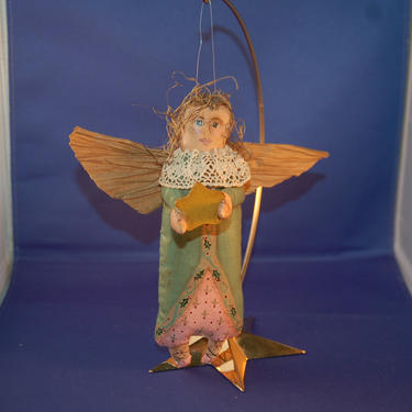 Signed Primitive Painted Oil Cloth '90s Christmas Angel w/ Lace Collar, Paper Wings, Excelsior Hair, Holding a Yellow Star Hanging Ornament 