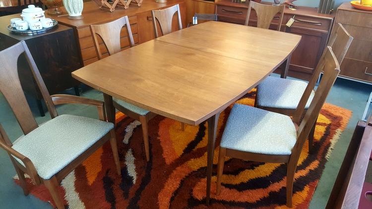 Mid-Century Modern walnut boat-shaped dining table from the Brasilia collection by Broyhill