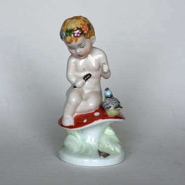vintage Royal Dux Bohemia child on a mushroom figurine made in the Czech Republic 