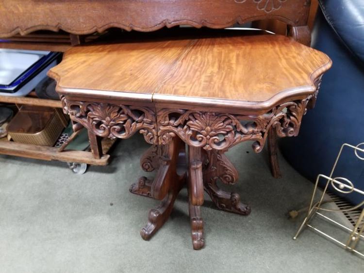                   Antique parlor table that separates into two demilune side tables