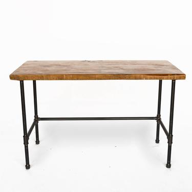 Recycled Wood Desk made with reclaimed wood and pipe legs.  Custom designs avaiable.  Choice of size, height and finish. 
