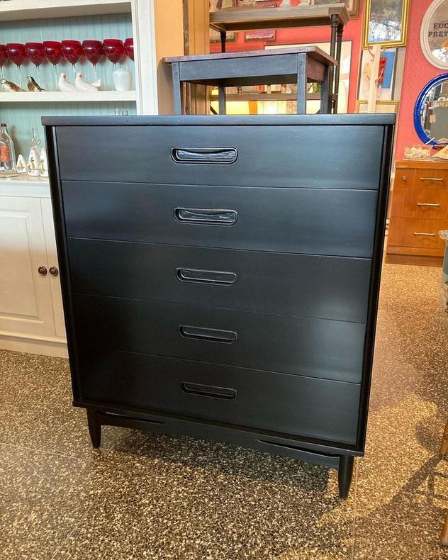 Black painted mid century chest of drawers with integrated pulls.  38” x 19” x 44.25”