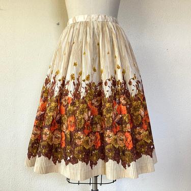 1960s Pleated nylon skirt with border print 