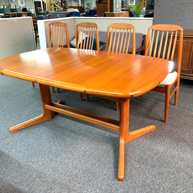 Danish teak extension table with fold out leaf