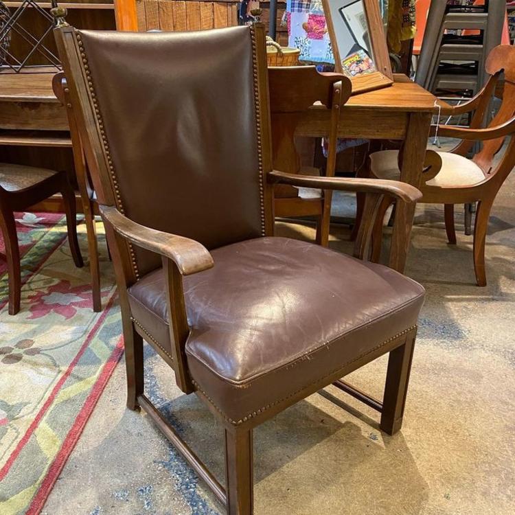 Brown leather armchair, seat 23”W x 22”L 