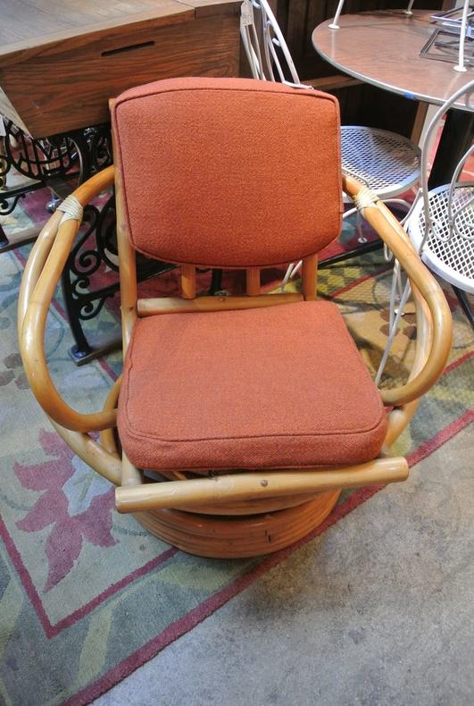 Rattan swivel chair. $135