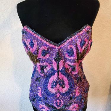 Purple fuchsia beaded silk bustier and corset, 1980's 