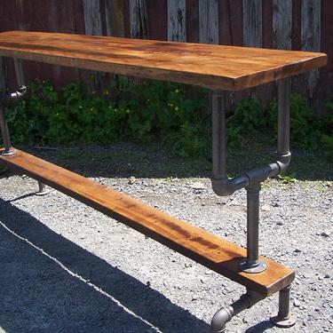 Industrial Style Bar Height Table with a Metal Pipe Base and Reclaimed Wood Plank Top 