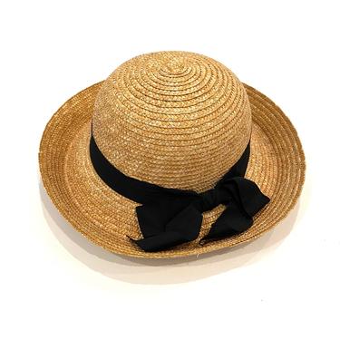 straw hat with black bow 