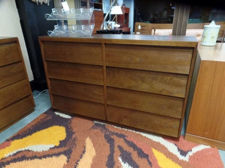 Mid-Century long dresser with angled drawer fronts. Peg Leg Vintage