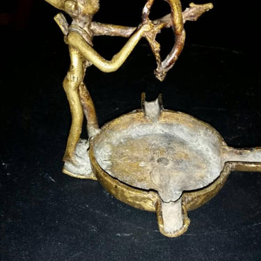 Beautiful Antique Bronze Elf Ashtray. Elf Figurine is holding a bow and arrow. 3 stem ashtray. Rare and Unique. Early century piece. 