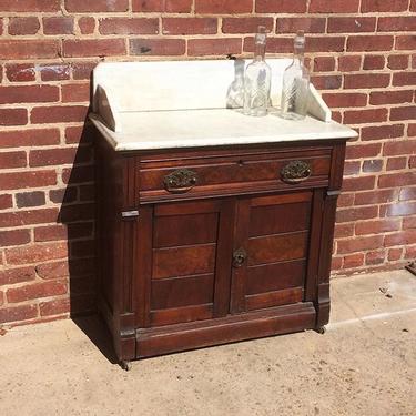 Antique wash stand (clearly intended to be a bar) with marble top