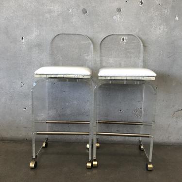 Pair of Mid Century Lucite Swivel Chairs on Casters