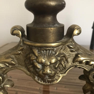 Vintage brass andirons - lion faces - paw feet 