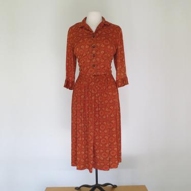 1960s orange rust polyester shirt dress with rhinestone buttons 