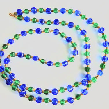 Long Egyptian Revival Glass Rhinestone Gold Tone Necklace 