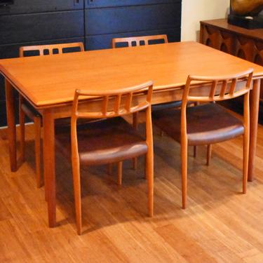 Newly-restored Danish teak expandable dining table (57.5&quot; to 104.5&quot; long) 
