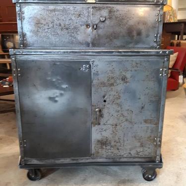 Vintage industrial stripped steel factory cabinet on casters 