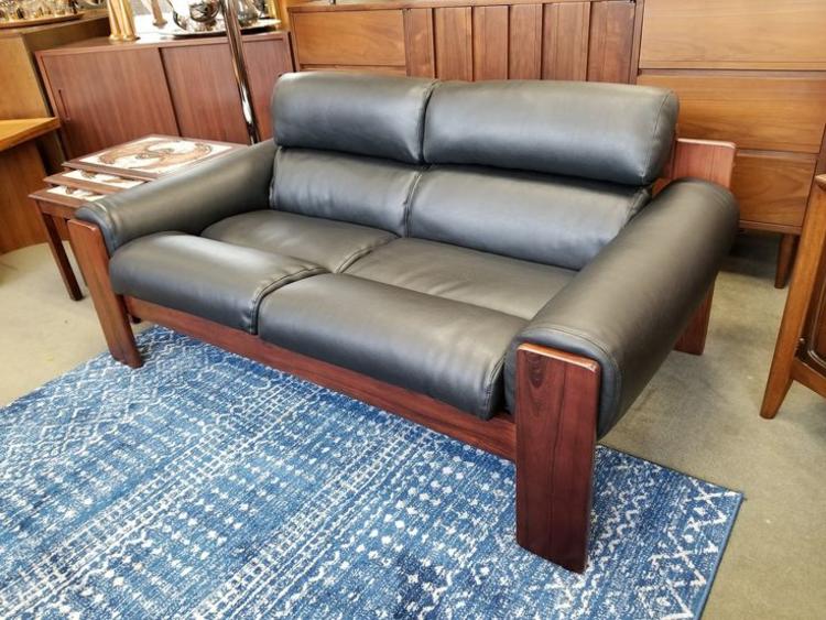                   Danish Modern low profile loveseat with rosewood frame