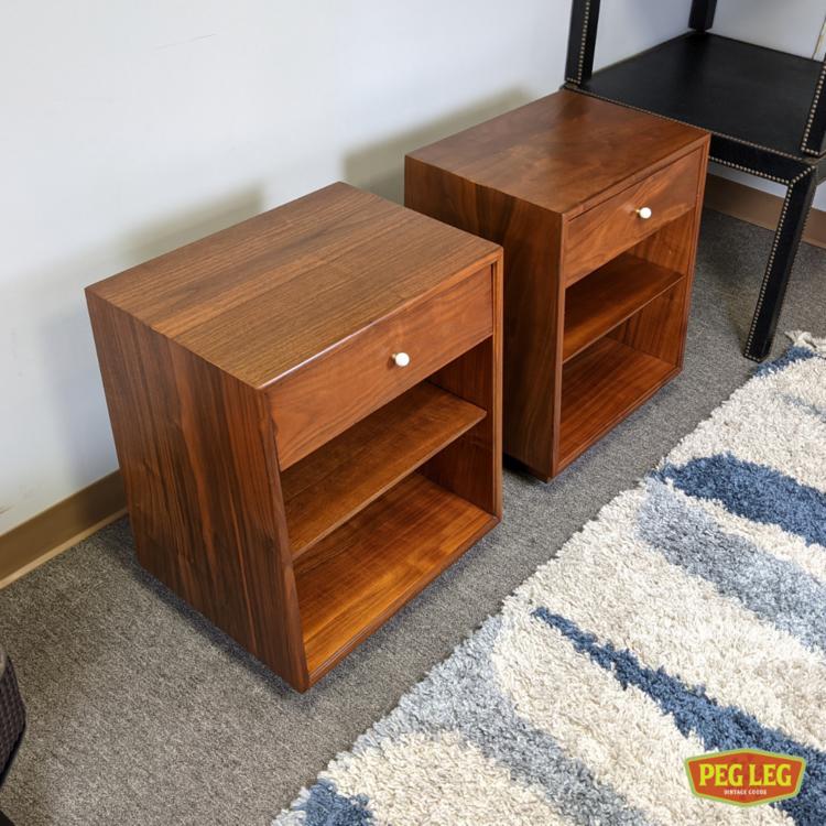 Pair of Mid-Century Modern walnut nightstands from the 'Declaration' collection