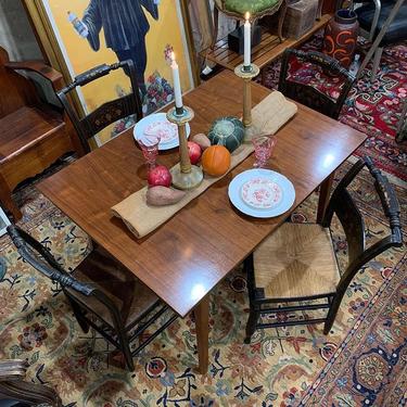 SOLD. Mid-century modern dining table with traditional rush bottom Hitchcock chairs
