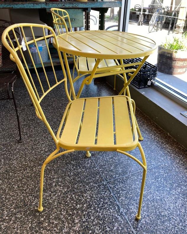 Yellow metal 3 piece set. Table is 26” x 27.5” and folds down. Chairs are 22” x 17.5” x 33”. Seat height is 17” 
