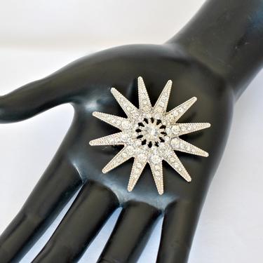 50's rhinestone silver plate starburst bling brooch, big unusual clear crystals in cut out silver metal mid-century sunburst statement pin 