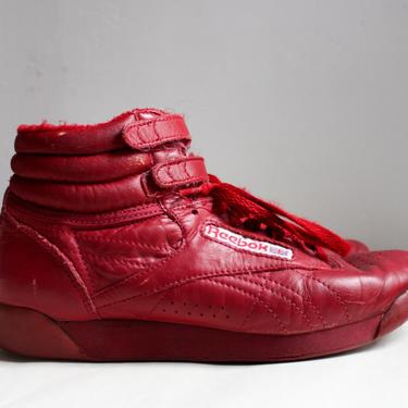 size 7.5 vintage reebok freestyle high tops in red 