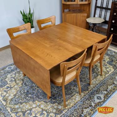 Mid-Century Modern maple drop-leaf dining table by Conant Ball