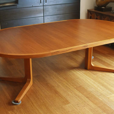 Restored Danish teak round-to-oval expandable dining table by Dyrlund - 90.25&quot; long 